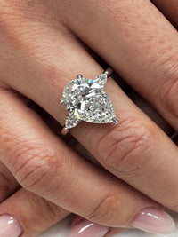 3 Carat E VVS2 Pear Lab Grown Diamond Ring Three Stone Solitaire IGI Certified