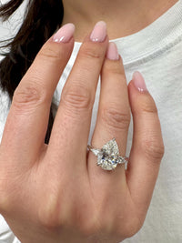 3 Carat E VVS2 Pear Lab Grown Diamond Ring Three Stone Solitaire IGI Certified