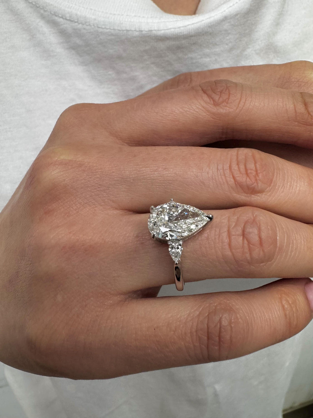 3 Carat E VVS2 Pear Lab Grown Diamond Ring Three Stone Solitaire IGI Certified